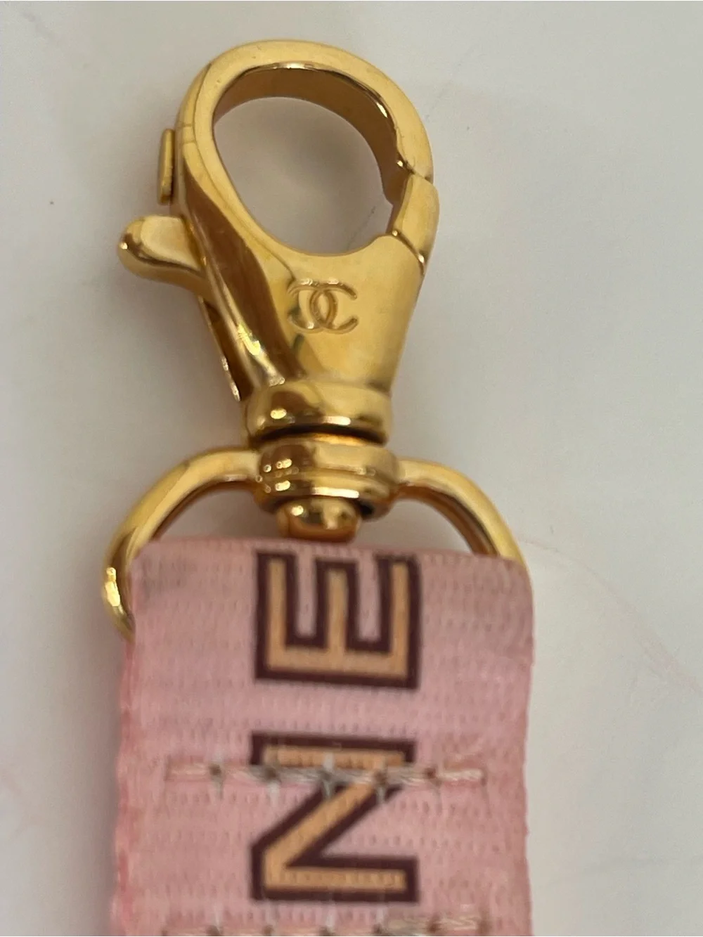 CHANEL Pink Chain-Print Lanyard with Gold Hardware